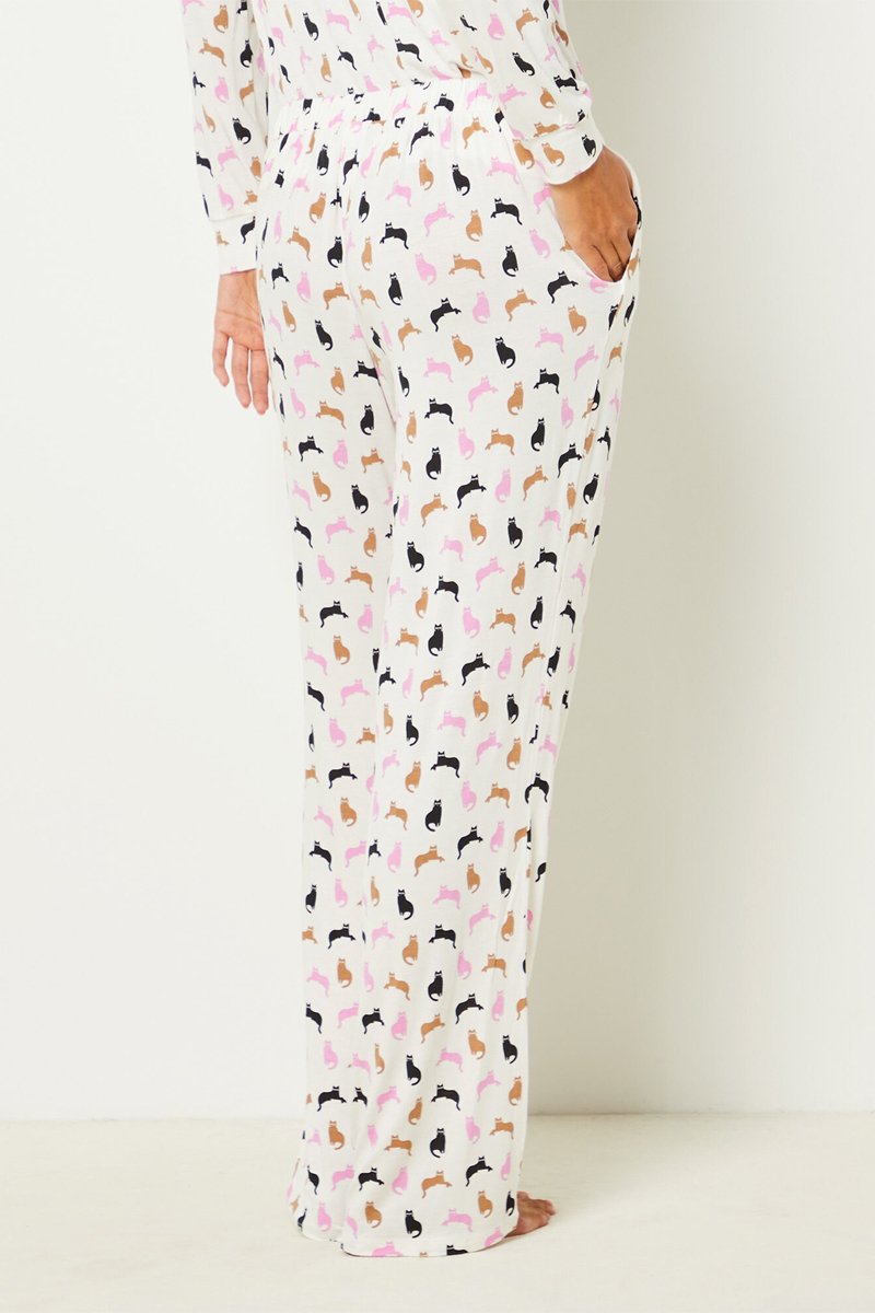 Pantalon de pyjama blanc fluide aux motifs animaux sauvages ludiques